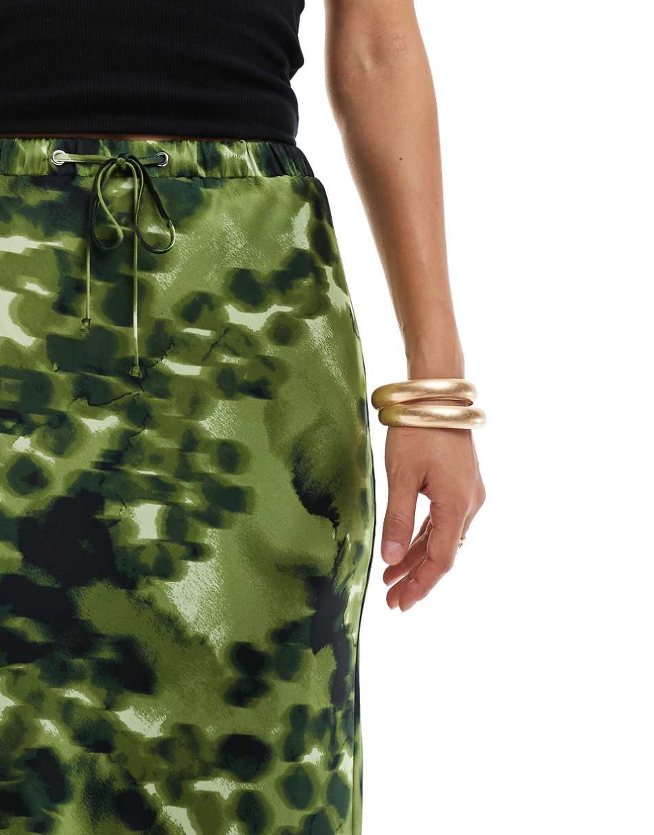 ASOS DESIGN satin bias tie waist maxi skirt in green animal print
