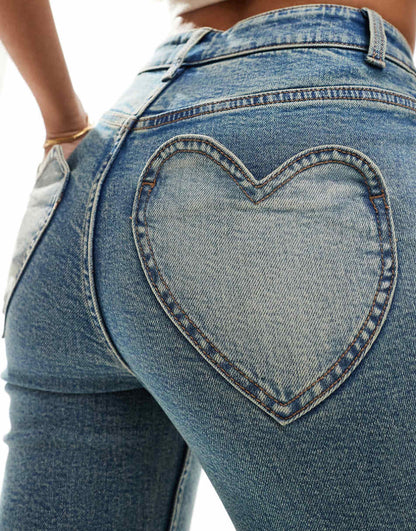 Miss Selfridge heart pocket flare jeans in dirty wash