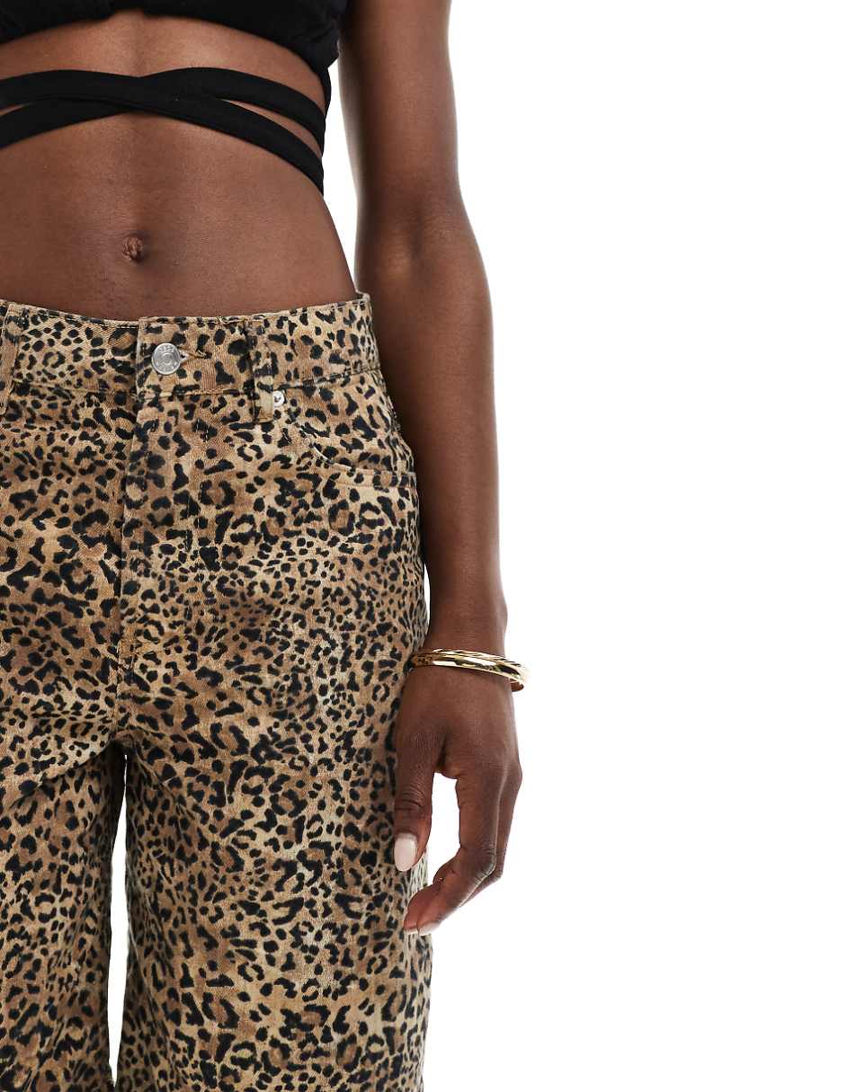 ASOS DESIGN denim bermuda shorts in leopard print