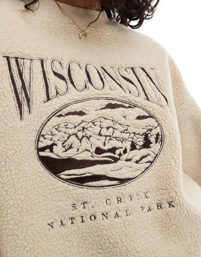 ASOS DESIGN wisconsin embroidered borg sweat