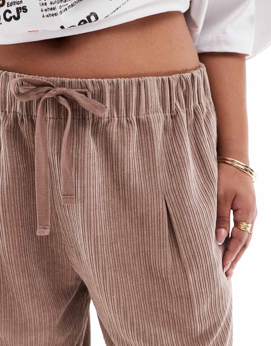 ASOS DESIGN Curve corduroy wide leg pull on pants in neutral