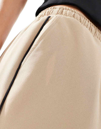 ASOS DESIGN tailored pull on pants with piping in sand