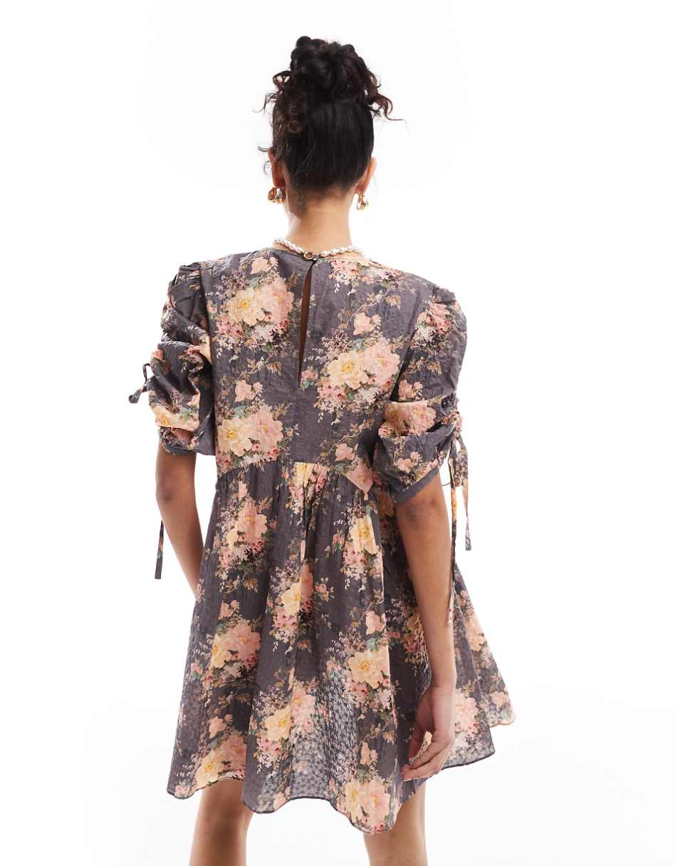 & Other Stories mini smock dress with tie detail volume sleeves in textured floral print