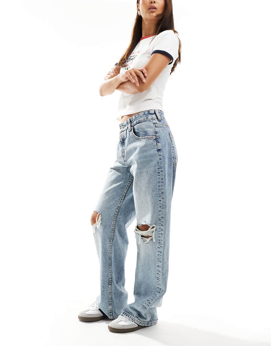 ASOS DESIGN mid rise baggy boyfriend jeans with knee rips in light tint