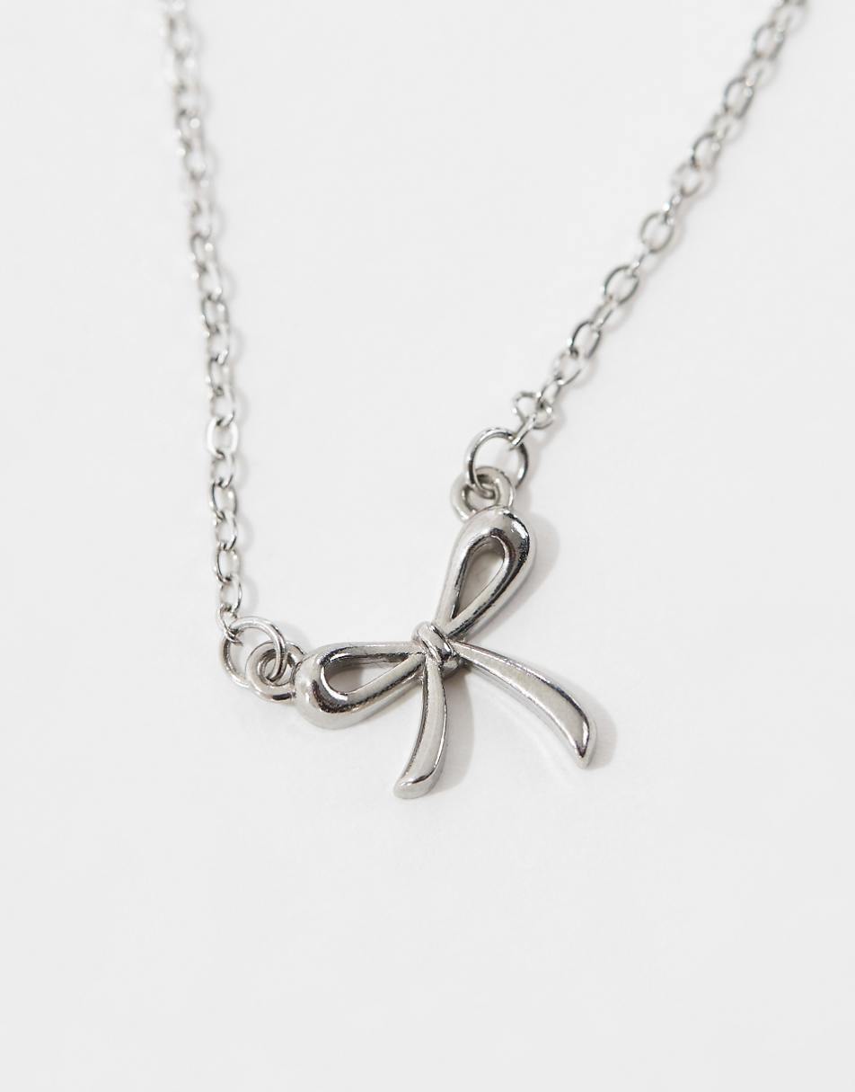 Lost Souls stainless steel bow pendant necklace in silver