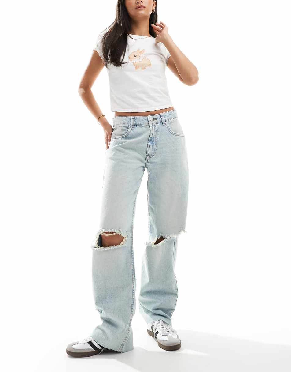 ASOS DESIGN mid rise baggy boyfriend jeans with rips in light wash