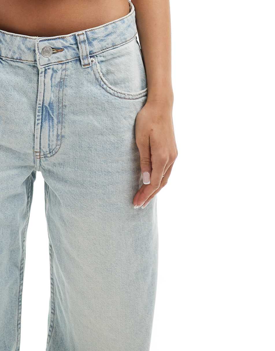 ASOS DESIGN mid rise baggy boyfriend jeans with rips in light wash