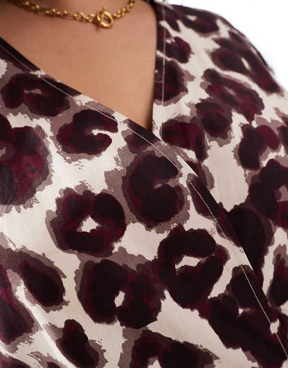 ASOS DESIGN Curve cotton v-neck mini smock dress in leopard print