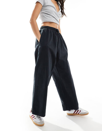 ASOS DESIGN oversized barrel leg pull on pants in black