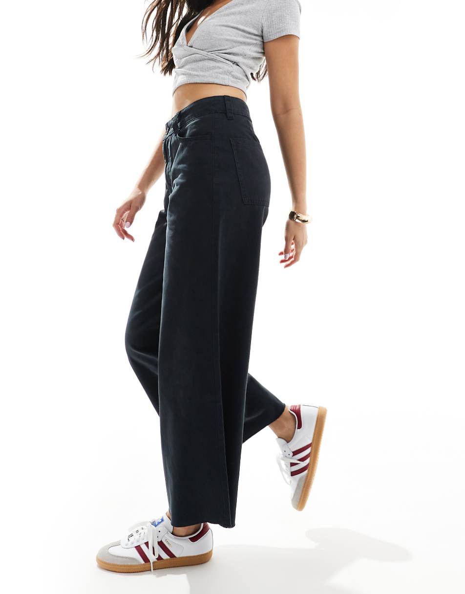 ASOS DESIGN cropped wide leg pants with raw hem in black