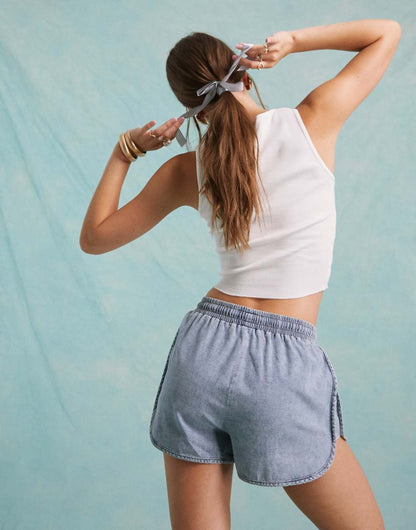 Miss Selfridge denim runner shorts in light blue wash