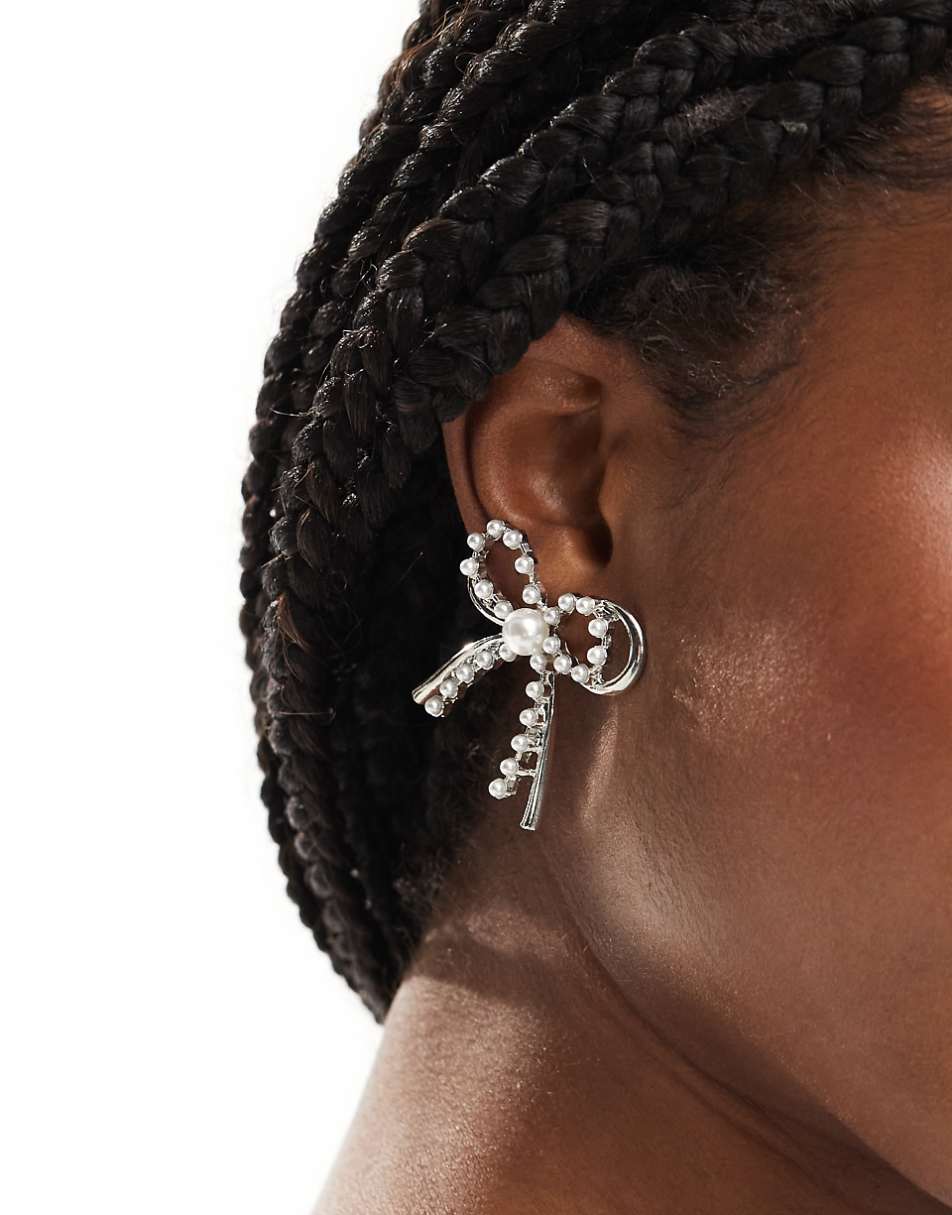 8 Other Reasons rhodium plated pearl embellished bow earrings in silver