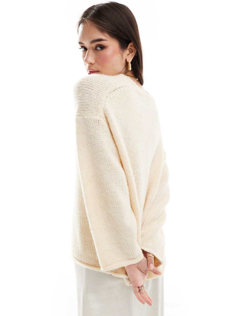 ASOS DESIGN loose knit v neck longline sweater in cream