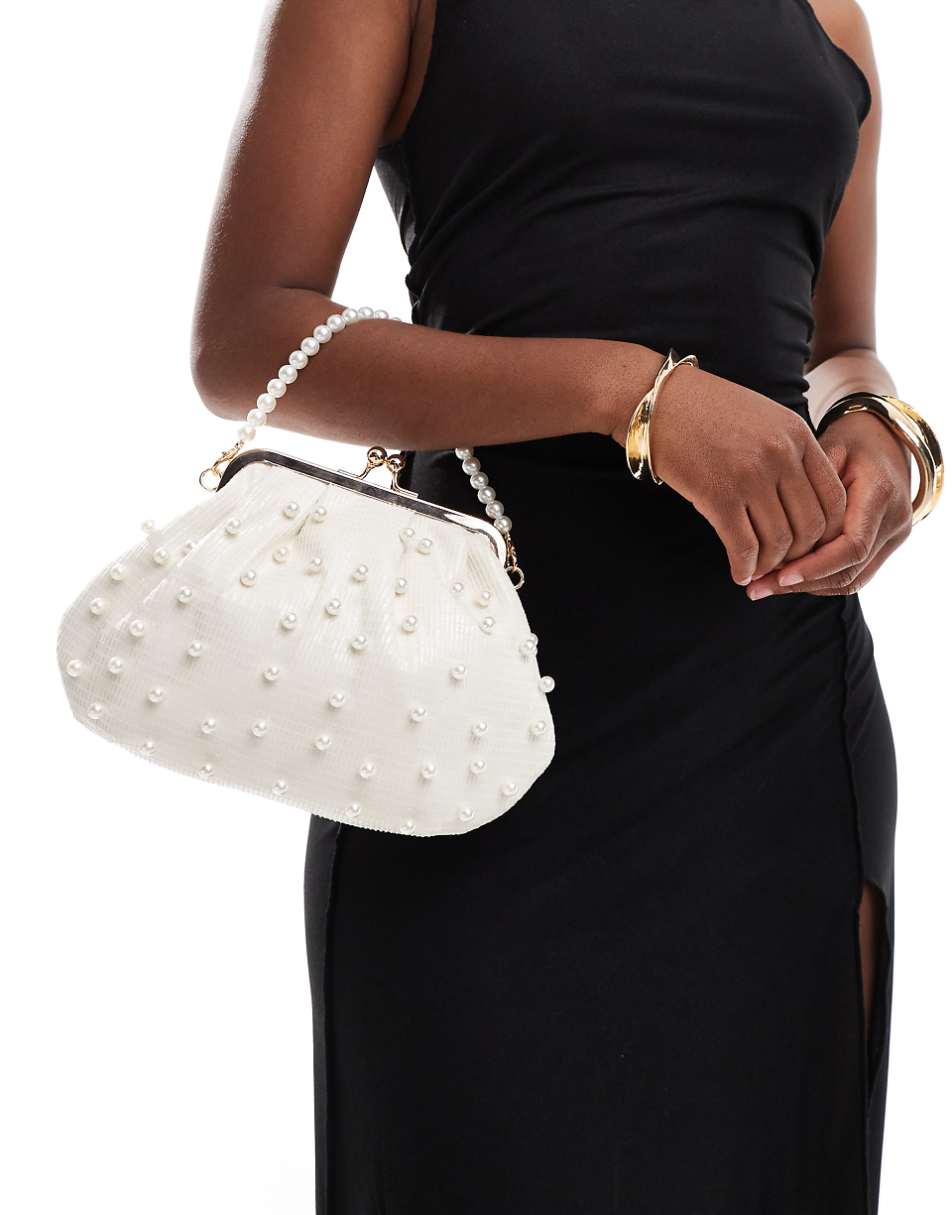 True Decadence pearl embellished bag with pearl handle in cream