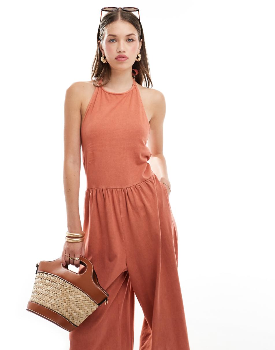 ASOS DESIGN halter neck trapeze jumpsuit in orange