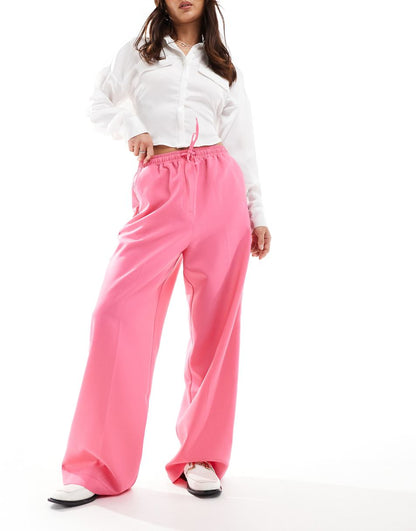 ASOS DESIGN tailored pull on pant with piping in pink