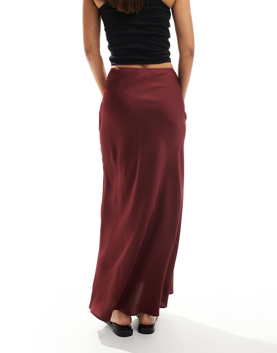 ASOS DESIGN satin bias cut maxi skirt in burgundy