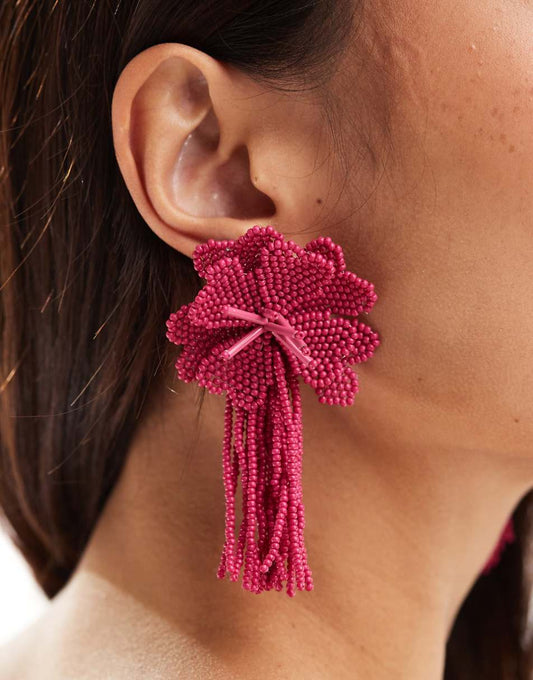 ASOS DESIGN drop earrings with beaded floral design in hot pink