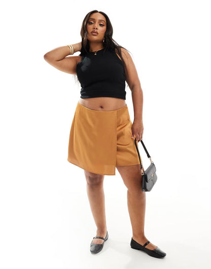 ASOS DESIGN Curve satin wrap mini skirt in golden dusk