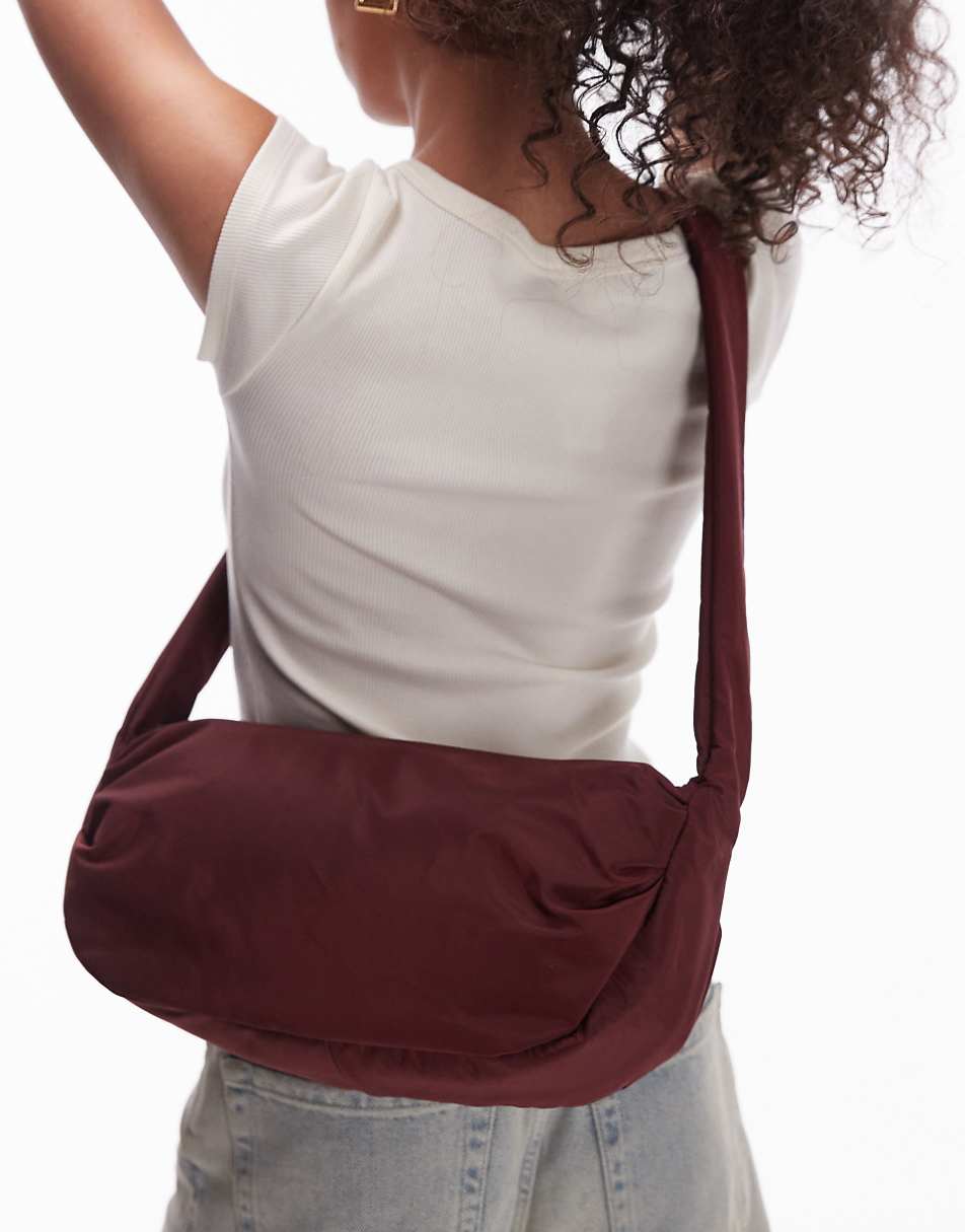 Topshop Con nylon cross body bag in burgundy