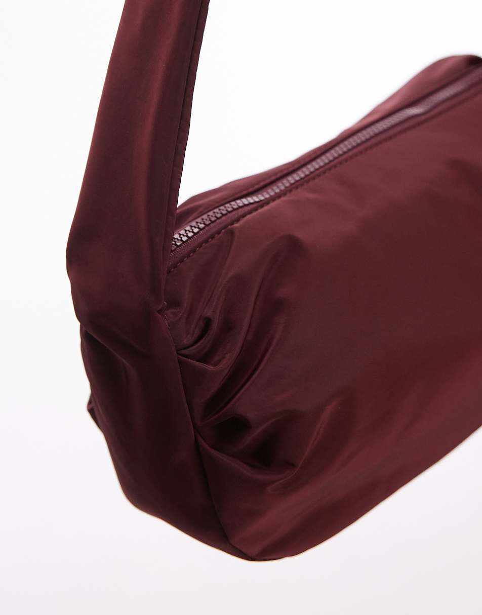 Topshop Con nylon cross body bag in burgundy