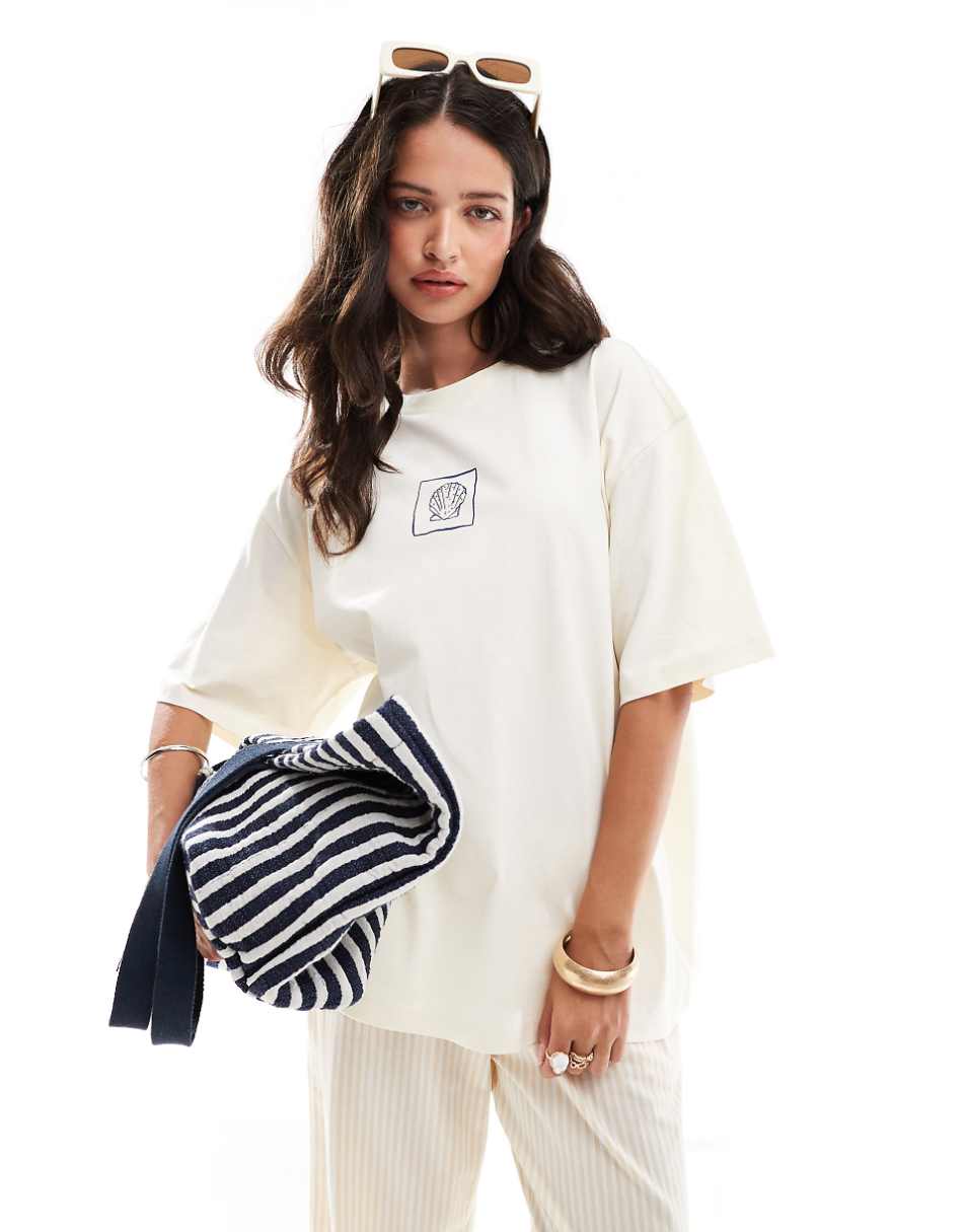 ASOS DESIGN oversized T-shirt with la mer shell graphic in cream