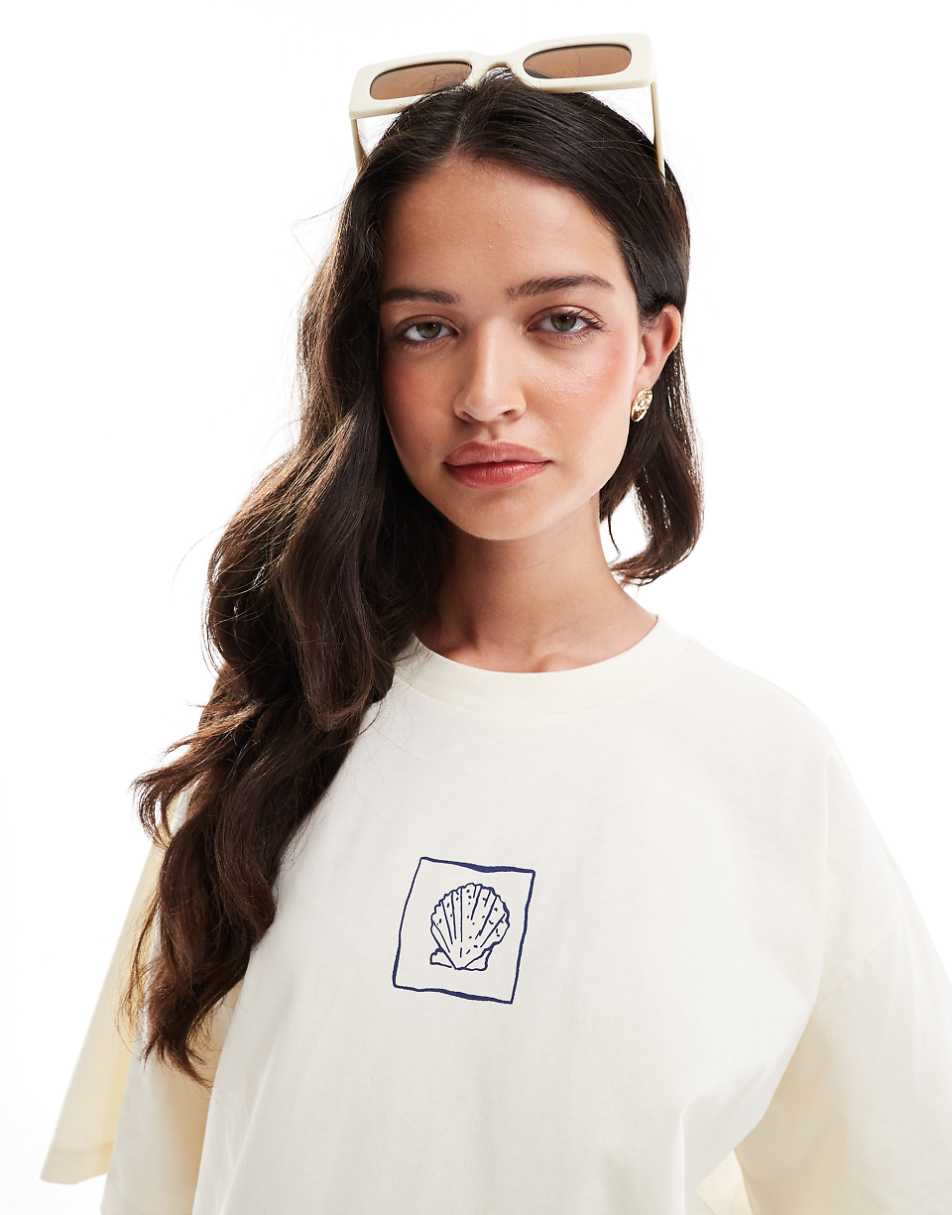 ASOS DESIGN oversized T-shirt with la mer shell graphic in cream