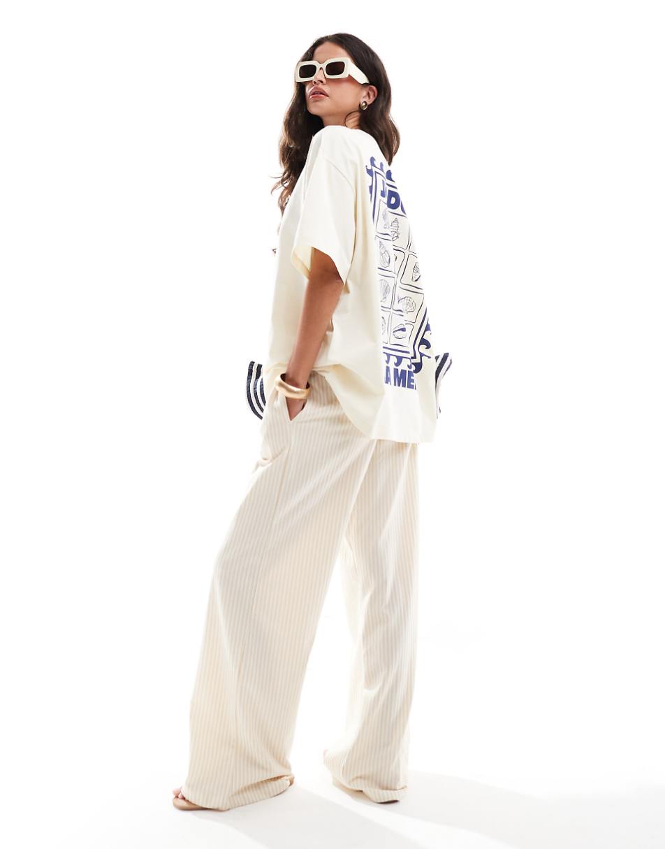 ASOS DESIGN oversized T-shirt with la mer shell graphic in cream