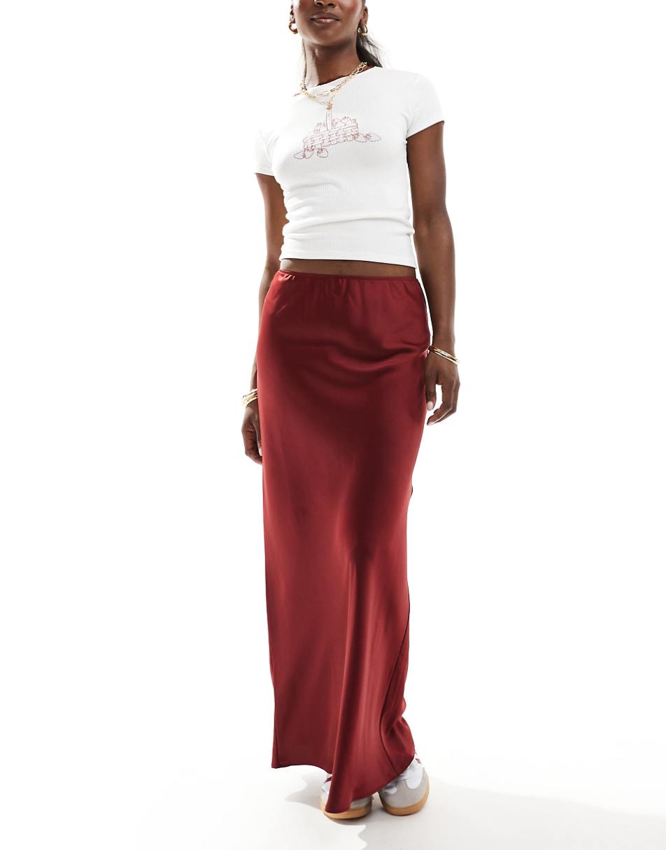 ASOS DESIGN satin bias cut maxi skirt in burgundy