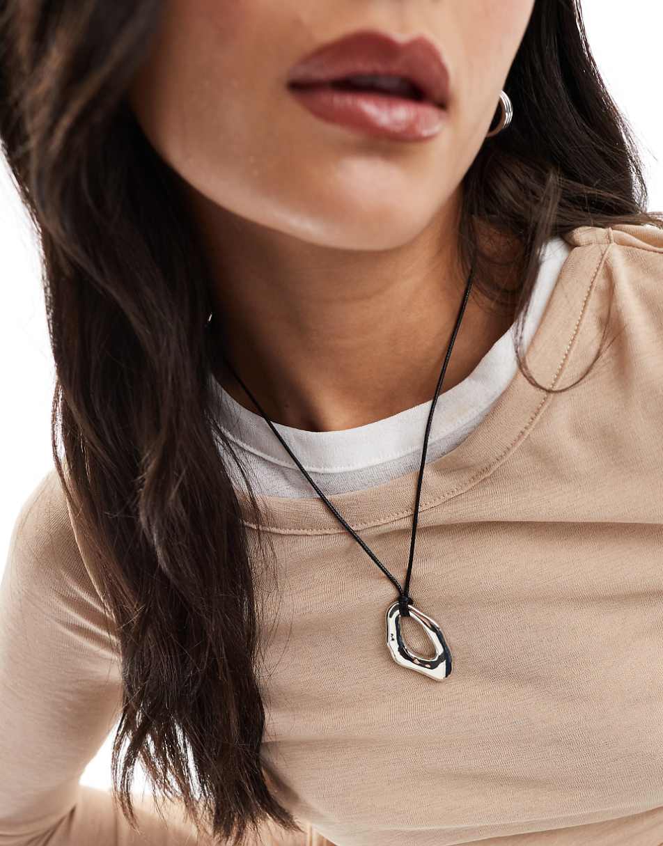 ASOS DESIGN necklace with cord and molten pendant in silver tone