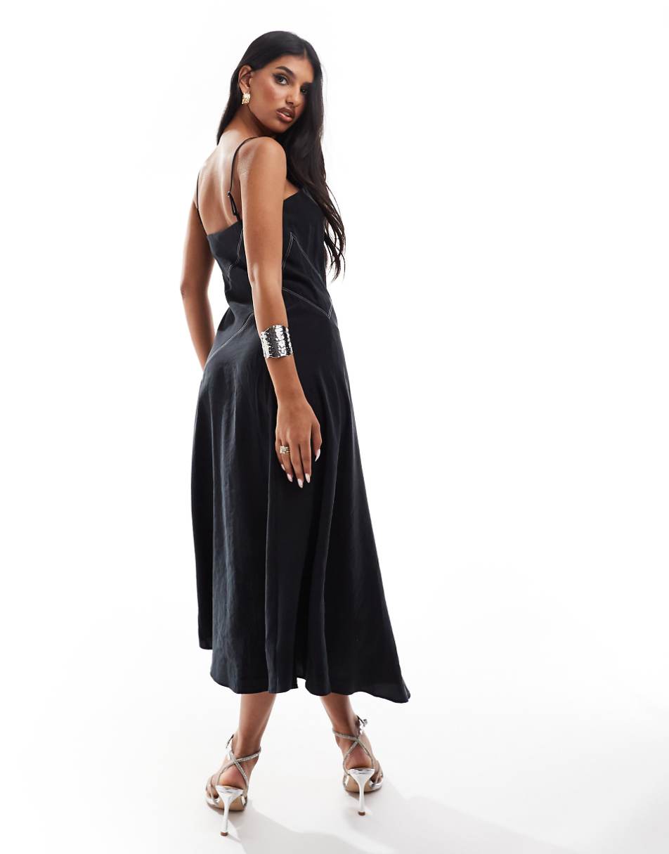 ASOS DESIGN full skirt slip dress in black with contrast stitch