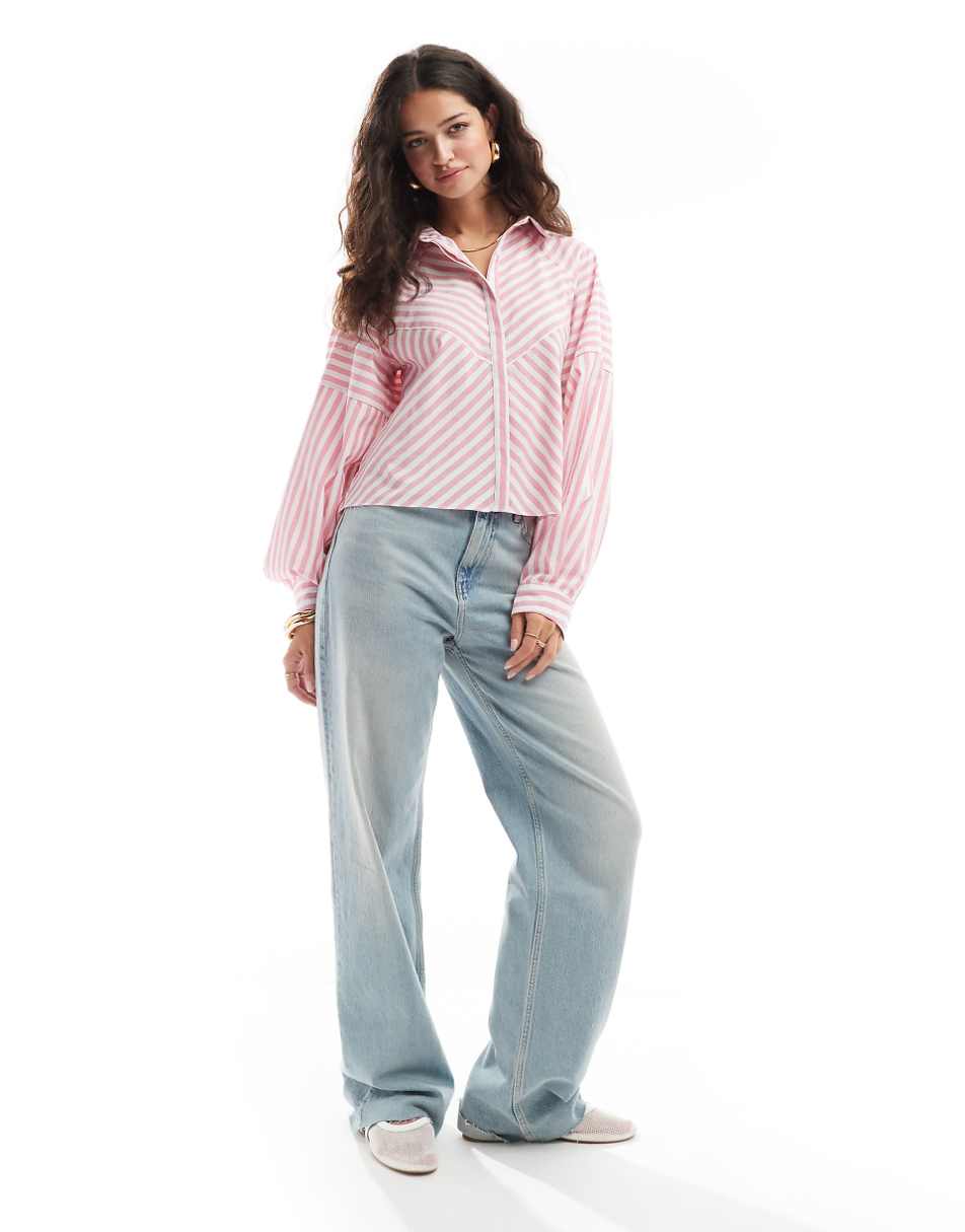ASOS DESIGN spliced detail volume shoulder shirt in pink stripe