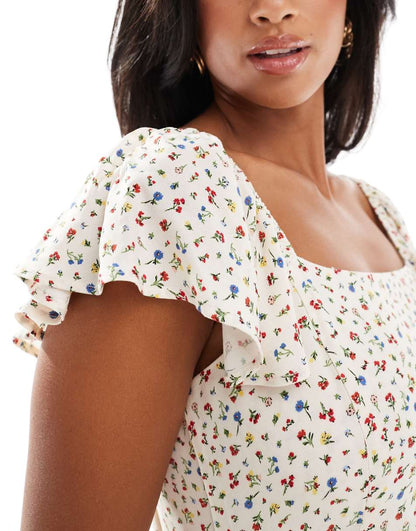 Nobody's Child Petite Elise midi dress with fluted straps in ditsy floral