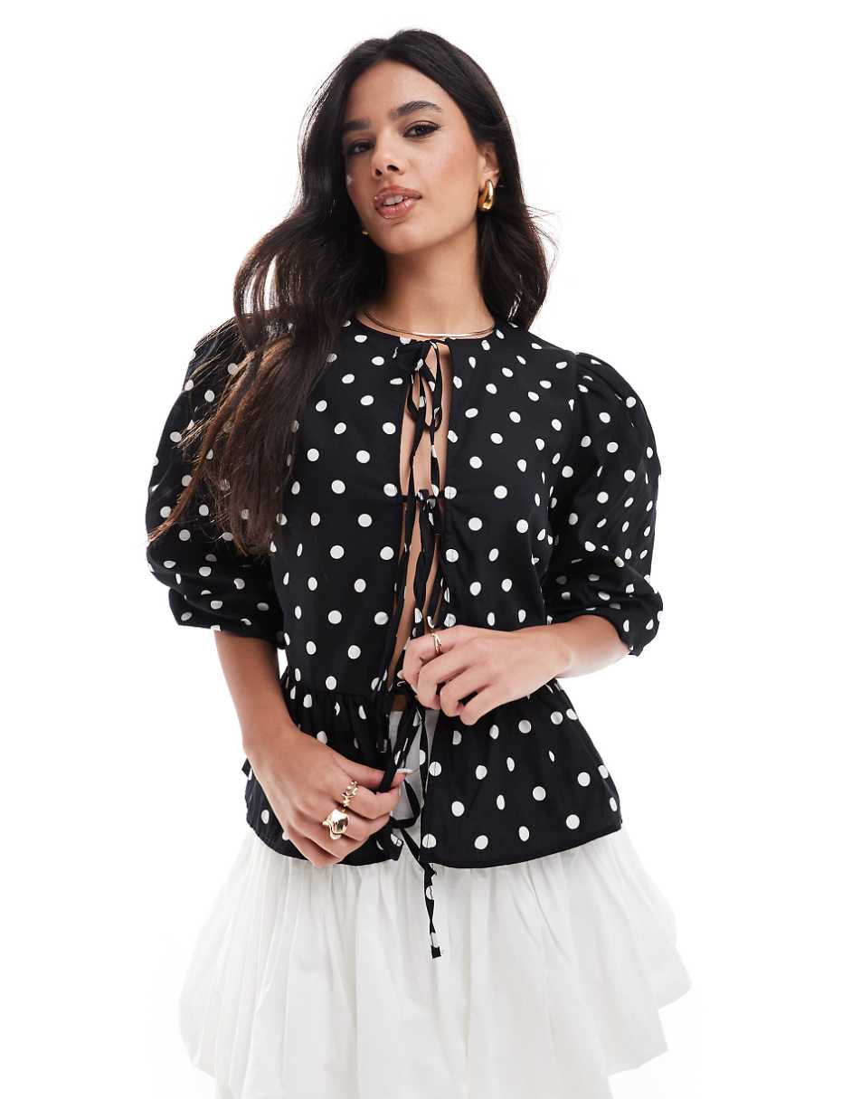 ASOS DESIGN cotton poplin peplum tie shirt top in black and white spot print