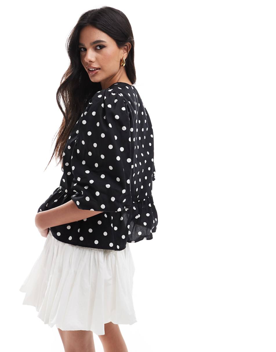 ASOS DESIGN cotton poplin peplum tie shirt top in black and white spot print