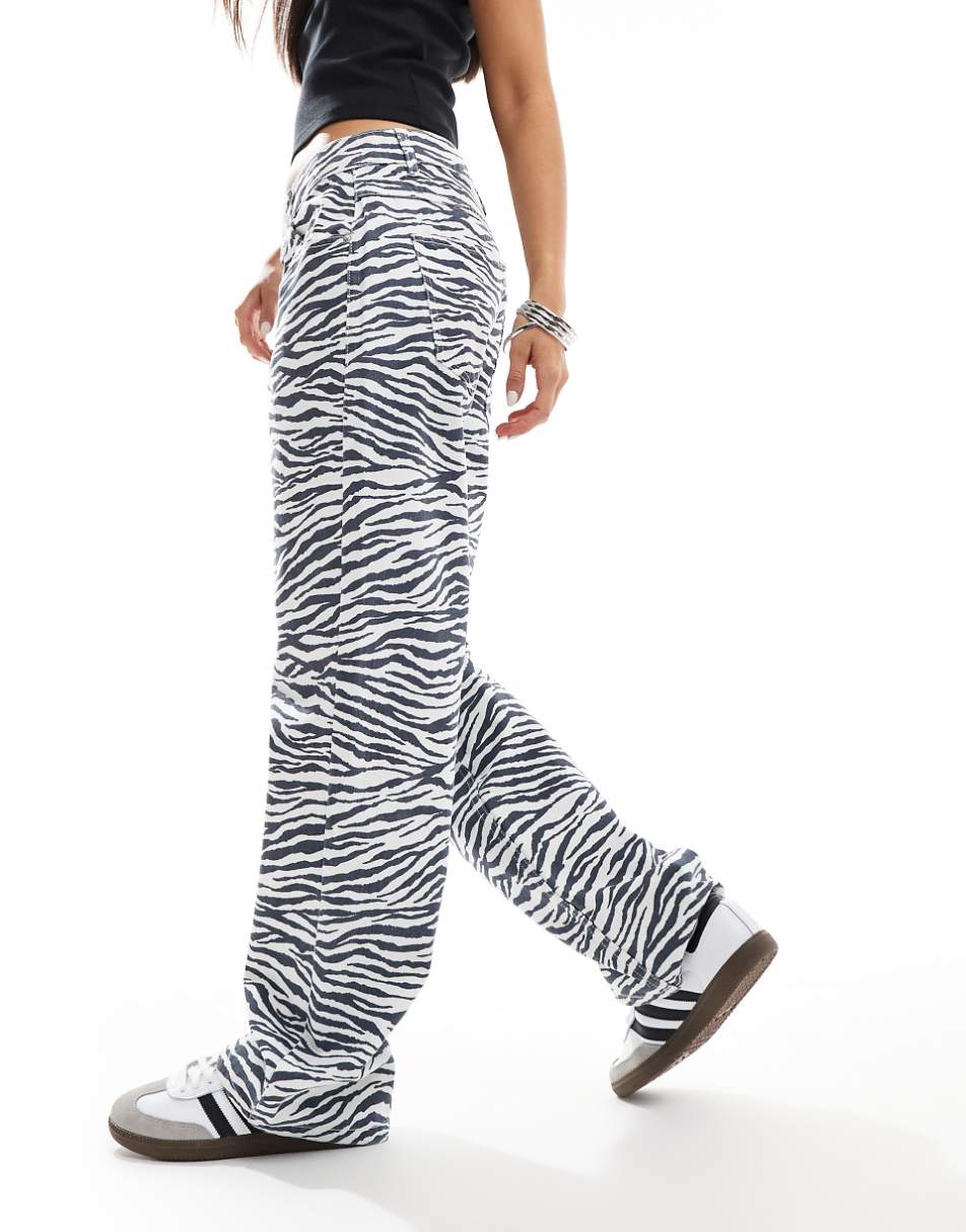 ASOS DESIGN mid rise baggy boyfriend jeans in zebra print