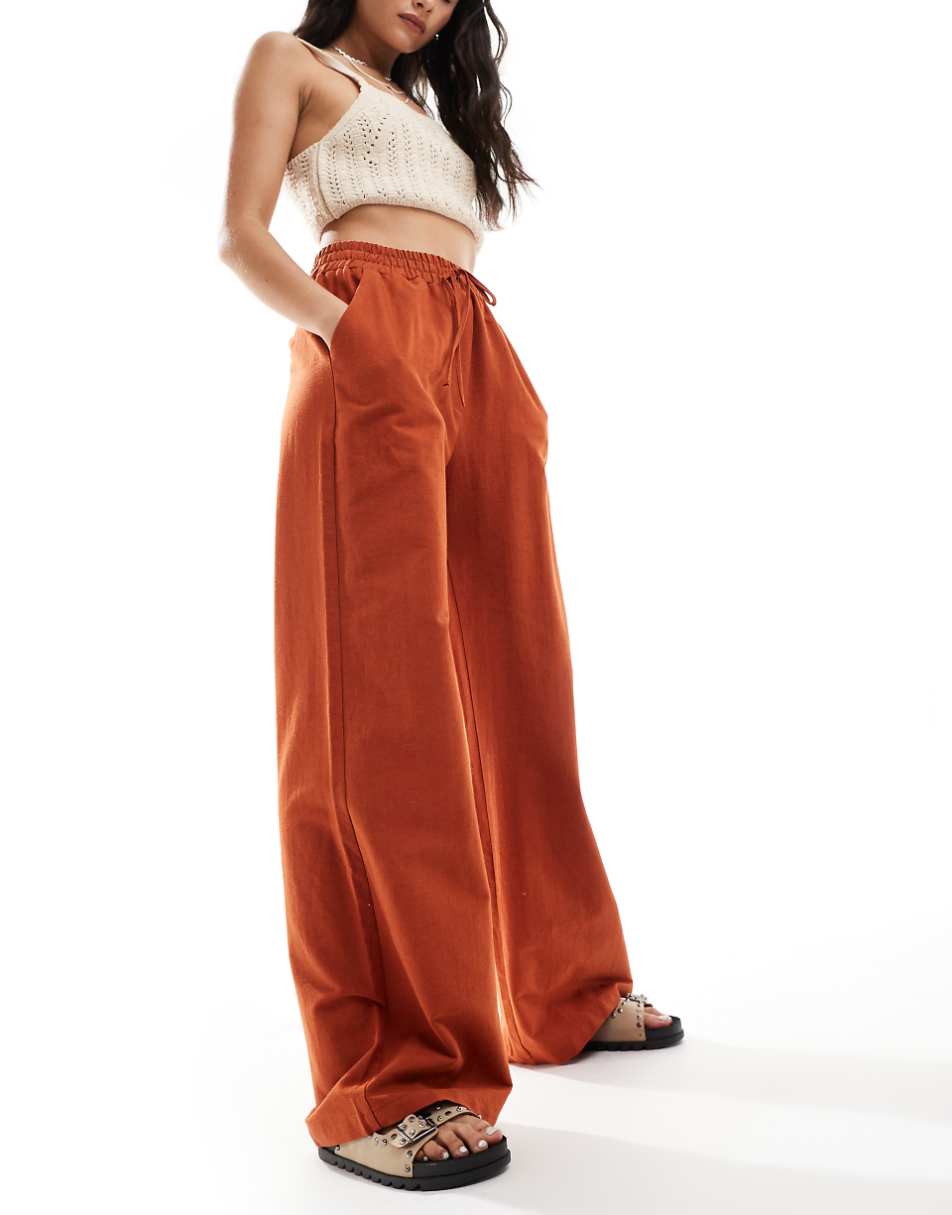 ASOS DESIGN tie waist wide leg pants with linen in terracotta