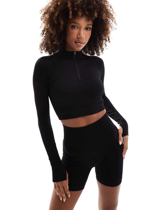 ASOS 4505 Icon seamless ribbed 1/4 zip long sleeve top in black