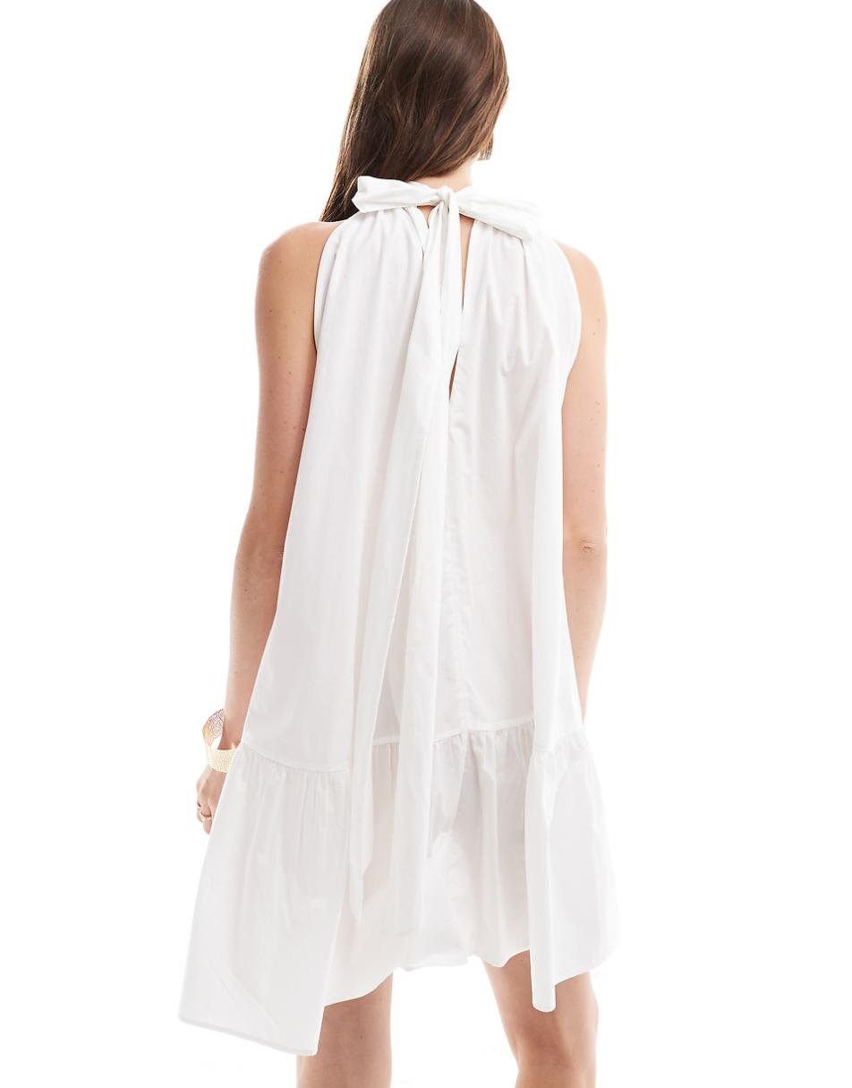 & Other Stories sleeveless mini dress with tiered hem and back bow tie in white