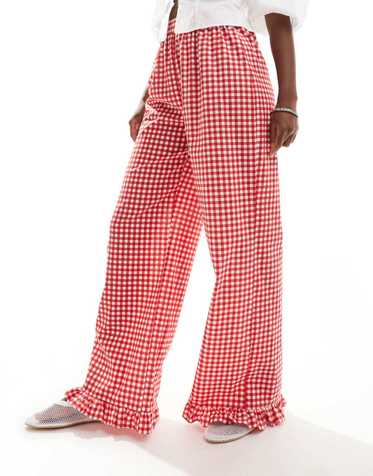 ASOS DESIGN gingham pants with frill hem in red