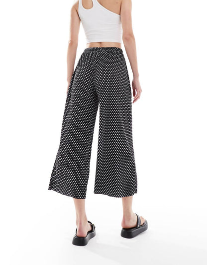 ASOS DESIGN Tall plisse wide leg culotte pants in polka dot