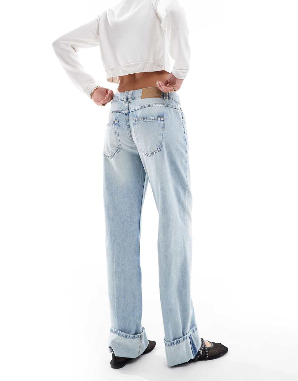 ASOS DESIGN mid rise baggy boyfriend jeans with turn up in light blue