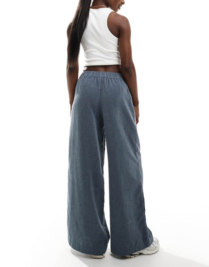 ASOS DESIGN box pleated corduroy pull on pants in blue