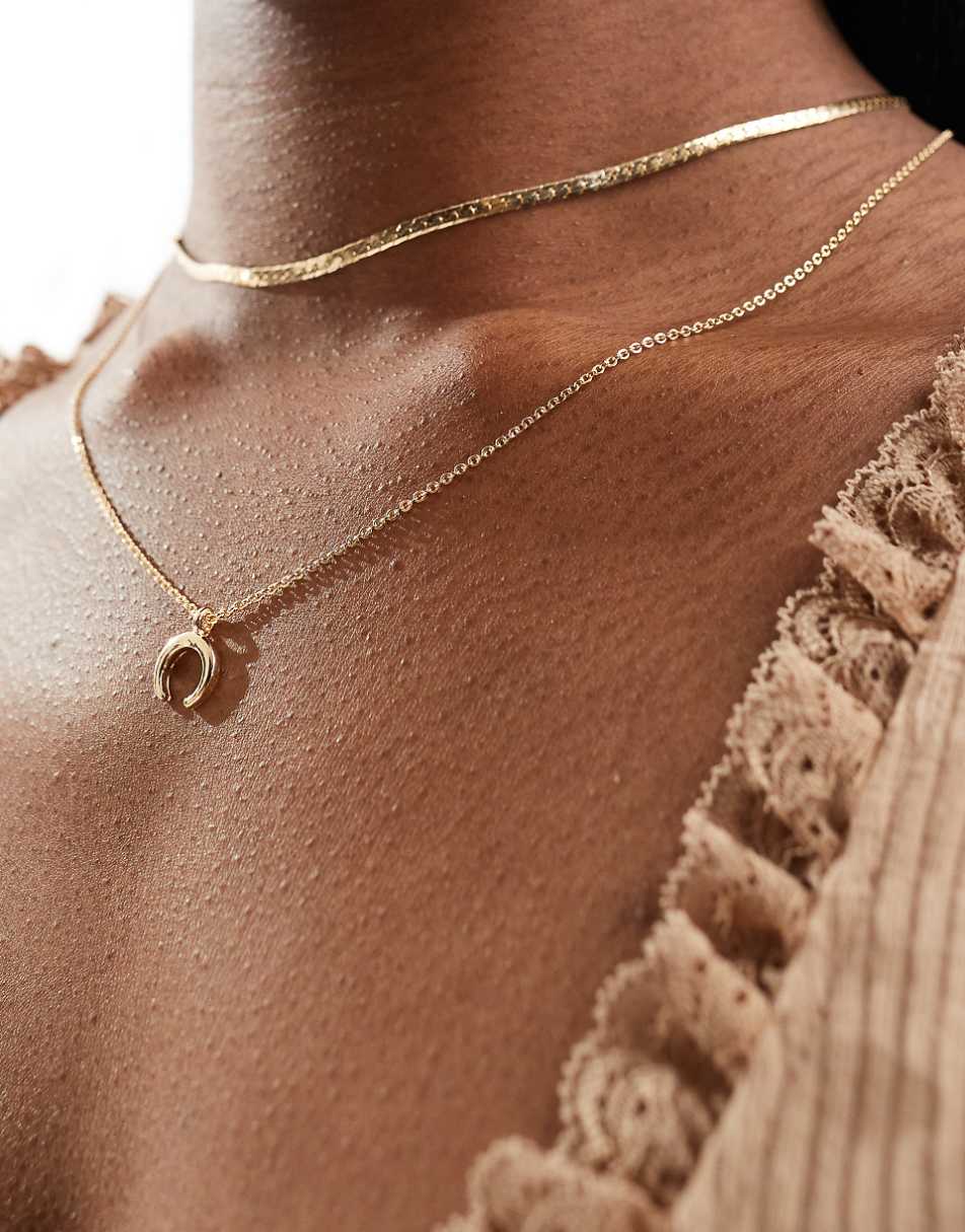 ASOS DESIGN multirow necklace with horn charm in gold tone