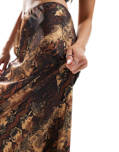 ASOS DESIGN satin bias cut midi skirt in animal print
