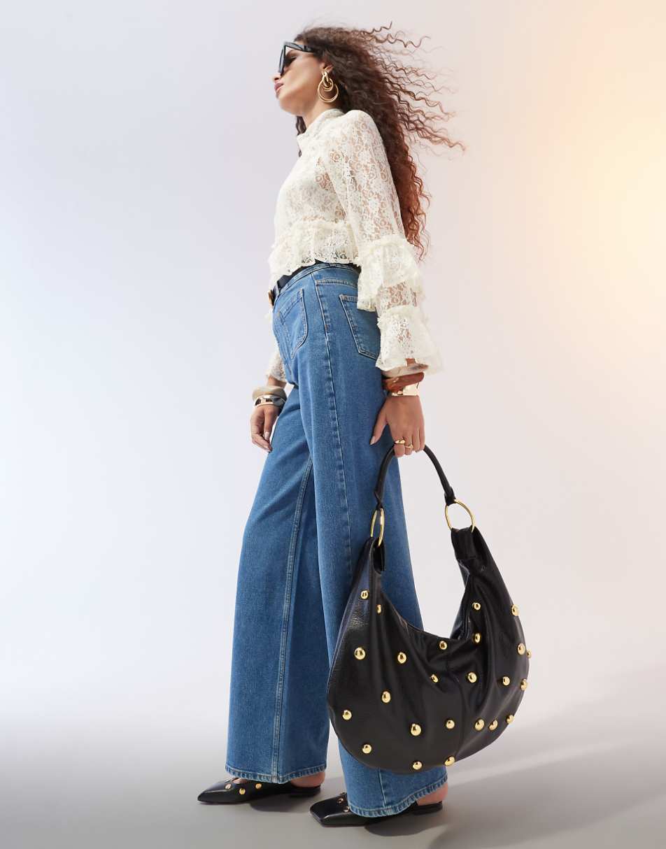 ASOS DESIGN clean wide leg jeans with front pockets in mid blue