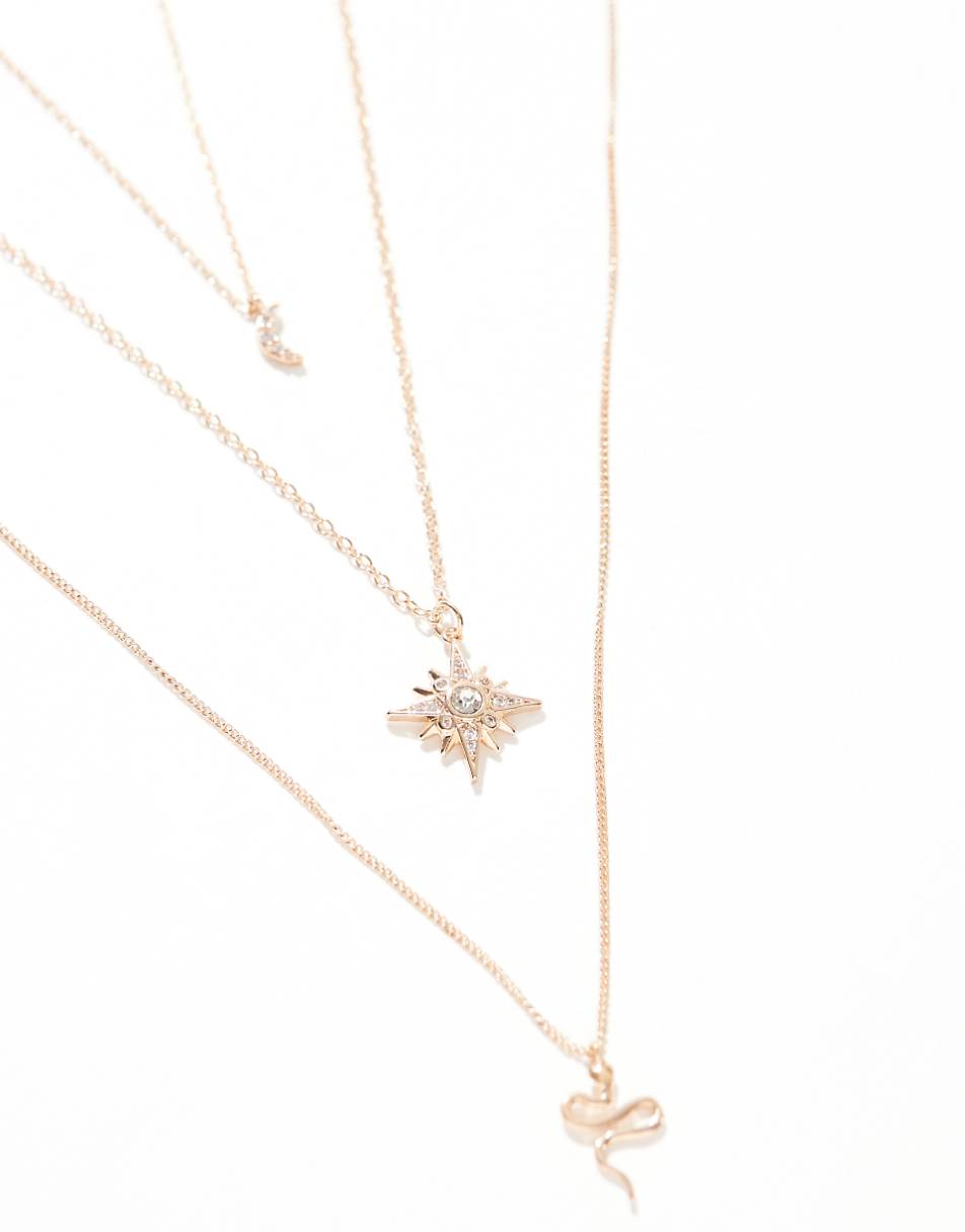 ASOS DESIGN multirow necklace with snake and celestial design in gold tone