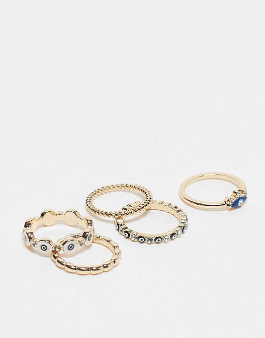 ASOS DESIGN Curve pack of 5 rings with mixed eye design in gold tone