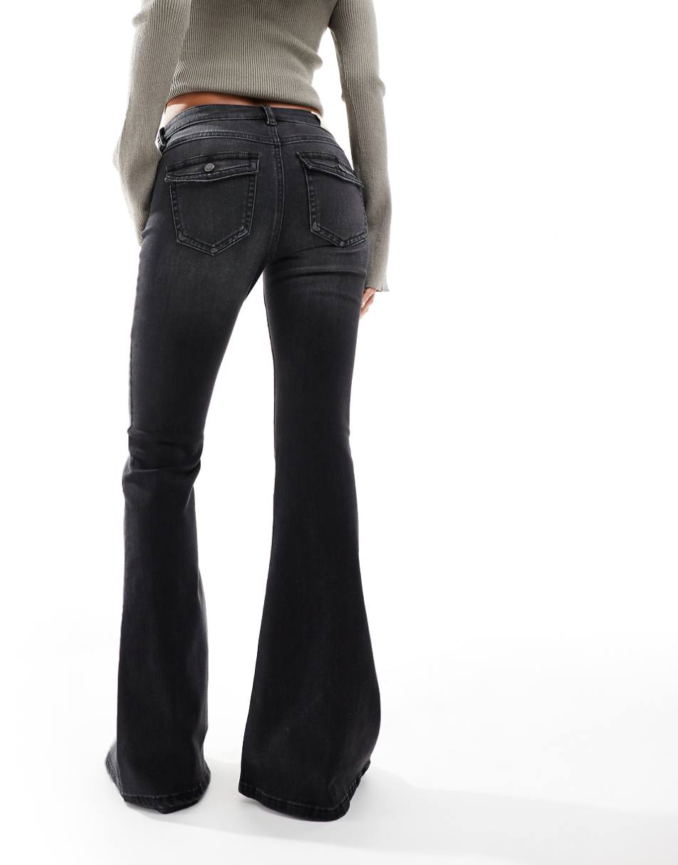 Stradivarius low rise flared jeans in black wash