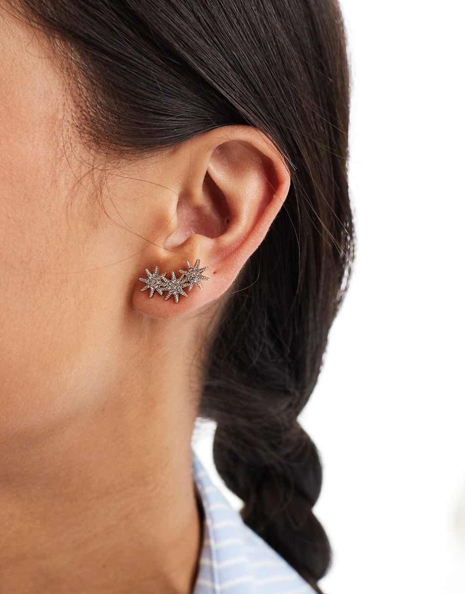 ASOS DESIGN stud earrings with multi star stud detail in gold tone